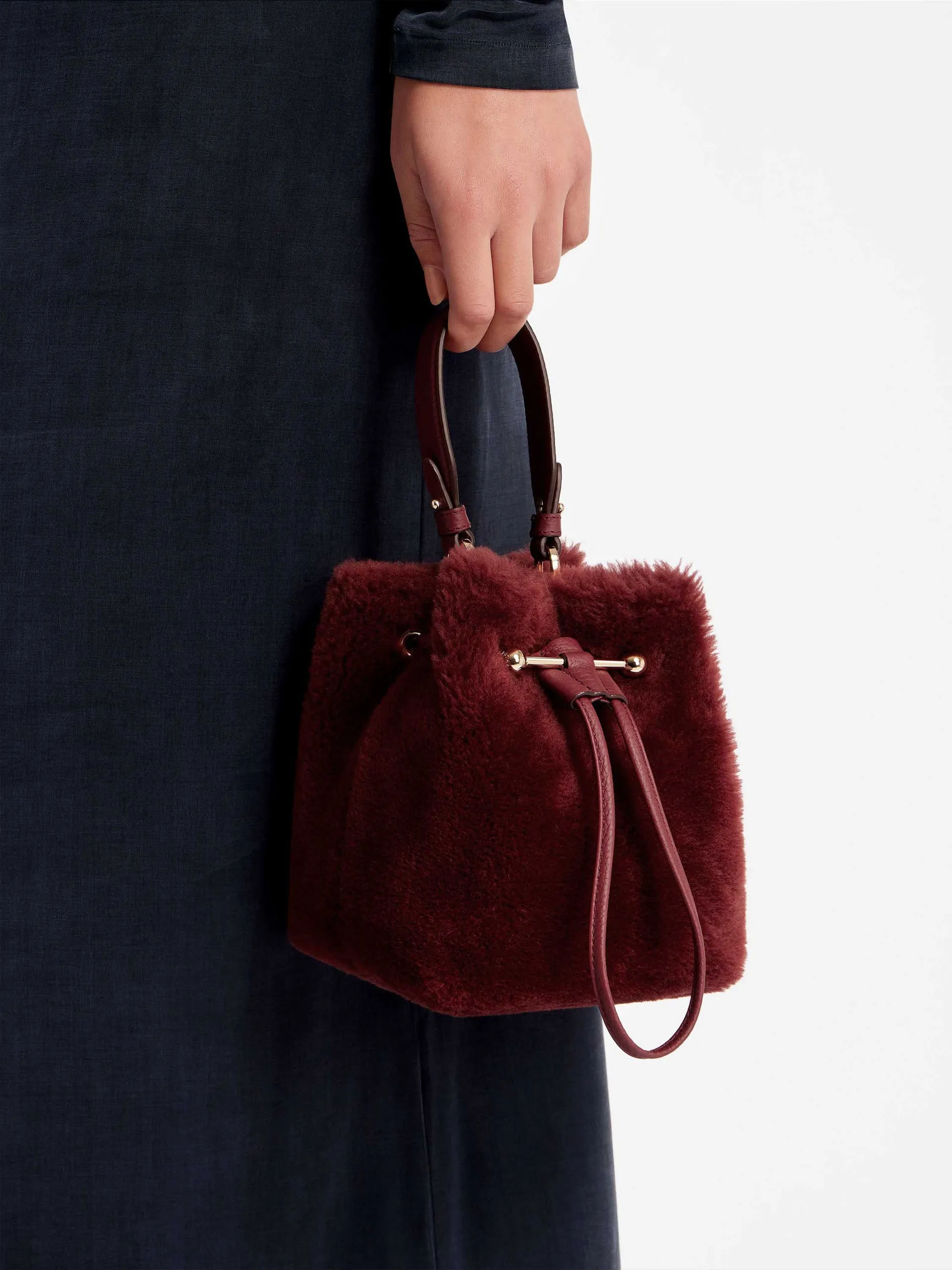 Oxblood shearling Osette bucket bag