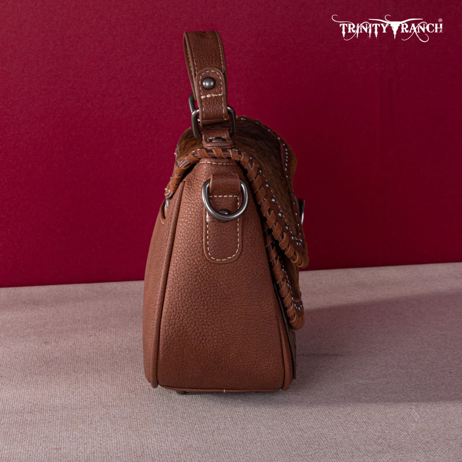 TR149-8360 Trinity Ranch Hair-On Cowhide Saddle Shape Collection Crossbody/Satchel -Brown