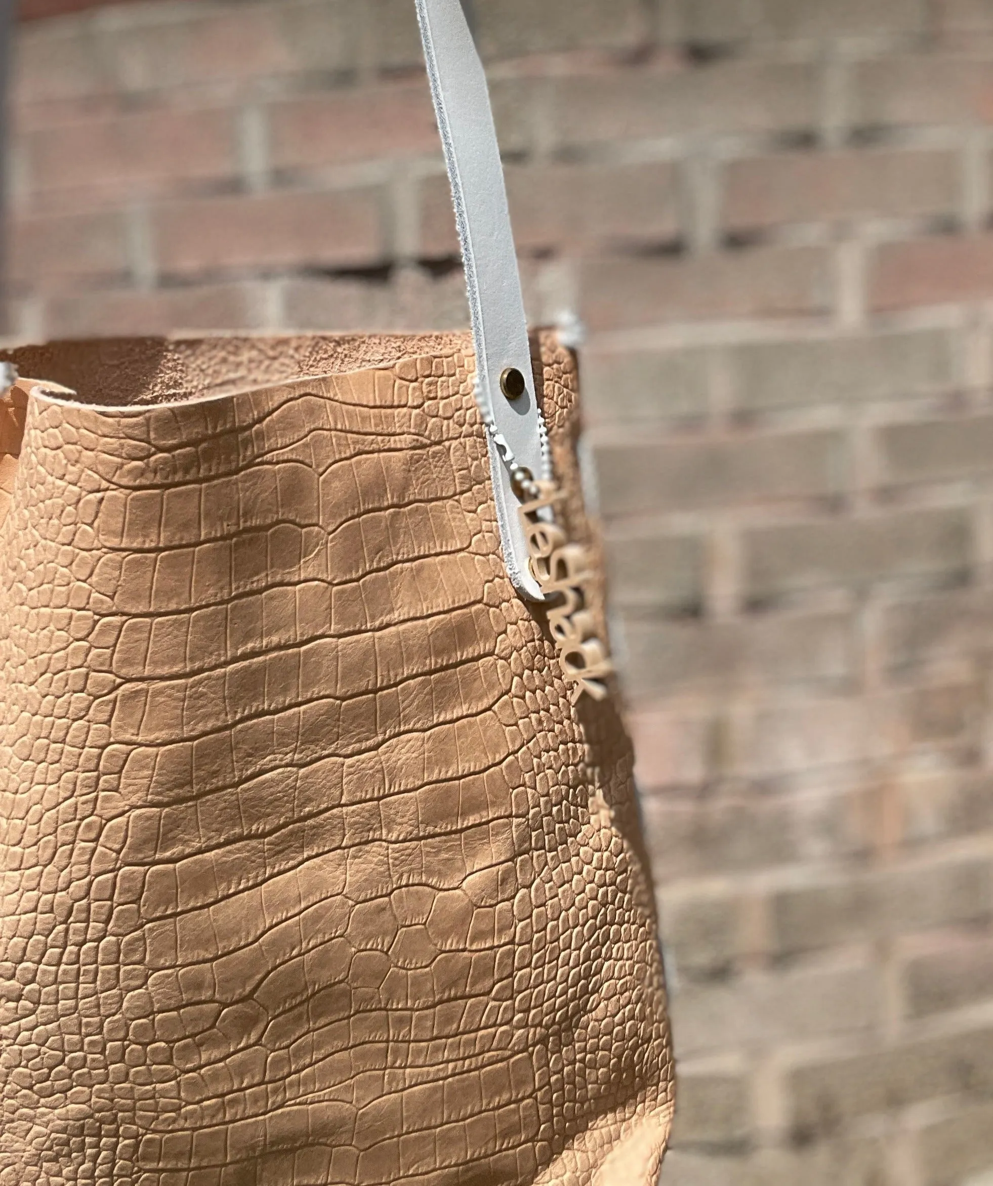 Veg Tan Embossed Crossbody Bag