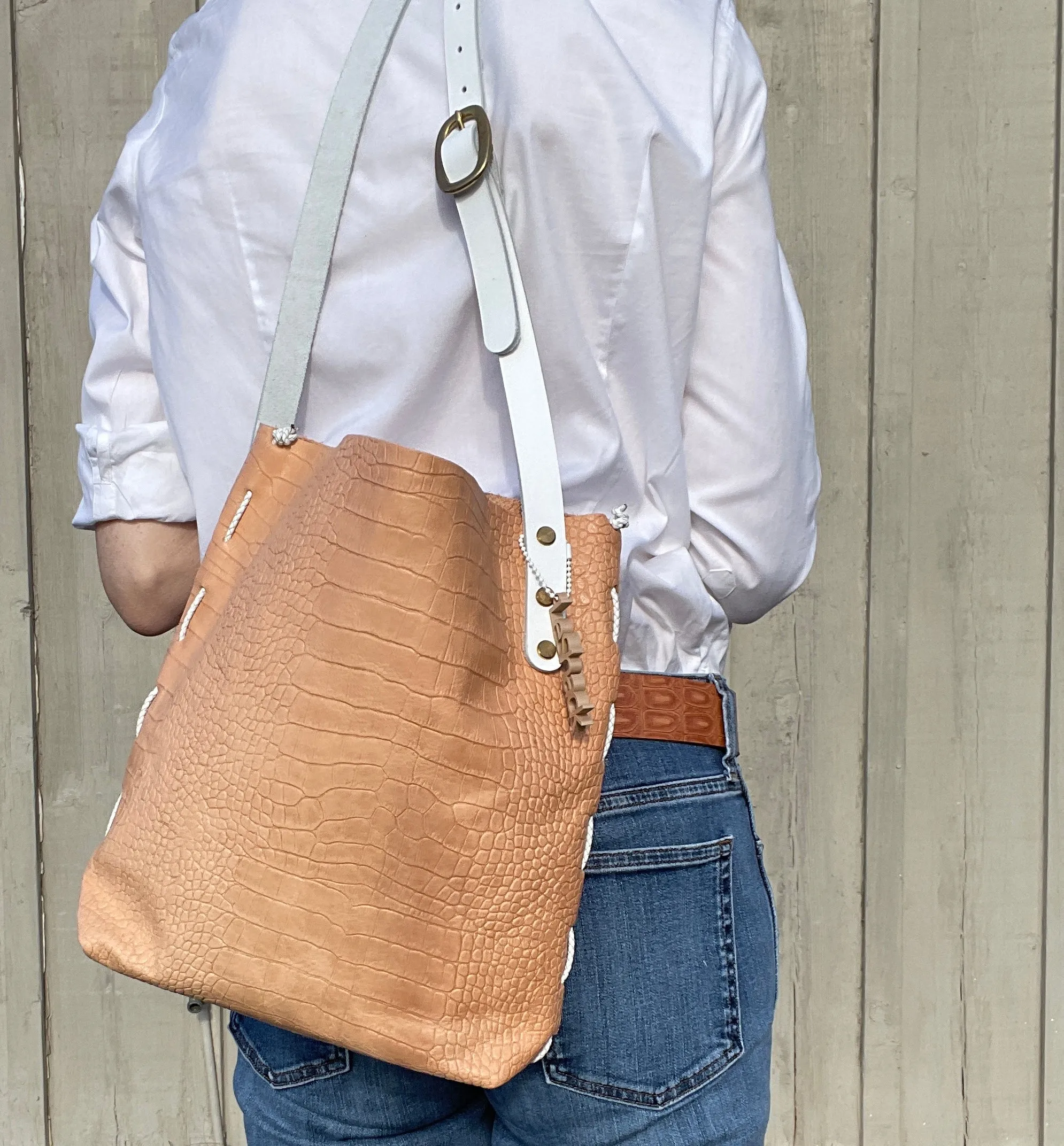 Veg Tan Embossed Crossbody Bag