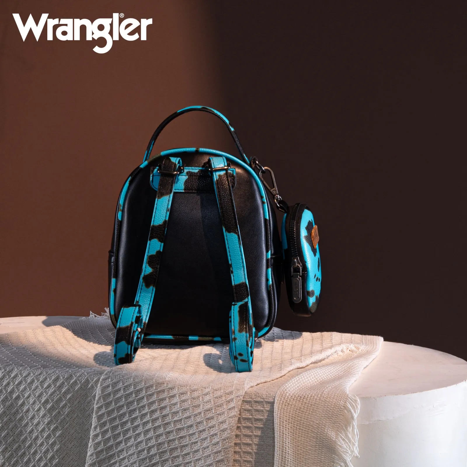 WG102-8600  Wrangler Cow Print  Trimmed Mini Backpack With Coin Pouch - Turquoise